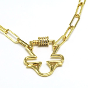 Detail of gold paperclip chain necklace with micro-paved rhinestone carabiner pendant