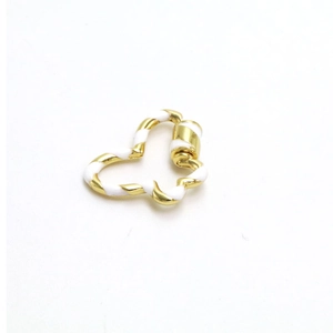 Detailed macro view of heart-shaped screw clasp for DIY jewelry in gold and white