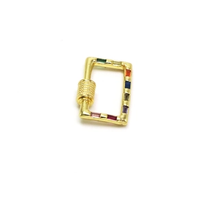 Detailed close-up of rainbow zircon screw clasp connector with gold plating for jewelry