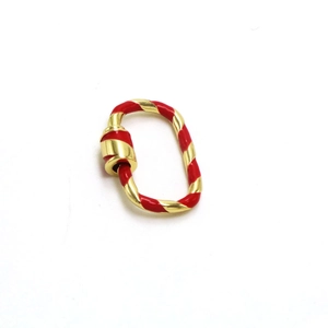 Detail view of red enamel and gold screw carabiner lock for DIY jewelry making