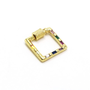Macro shot of gold screw carabiner with colorful zircon stones for DIY jewelry