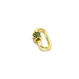 Close-up of golden oval carabiner clasp with green zircon micro-pave setting for jewelry