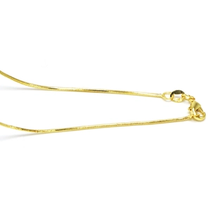 Detail of a golden snake chain with a lobster clasp closure on white background