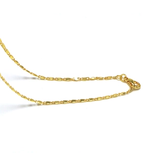 Close-up of golden flat box chain necklace featuring a durable lobster claw clasp