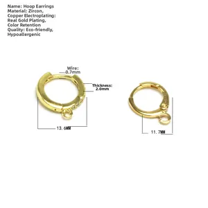 Detail of 14K gold plated earring hoops with cubic zirconia and smooth finish