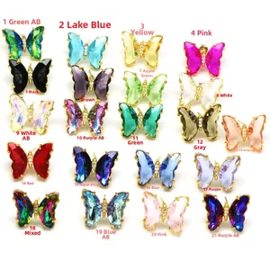 Colorful crystal butterfly stud earrings in various shades with gold alloy plating