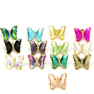 Crystal butterfly stud earrings in thirteen colors with gold-plated metal accents