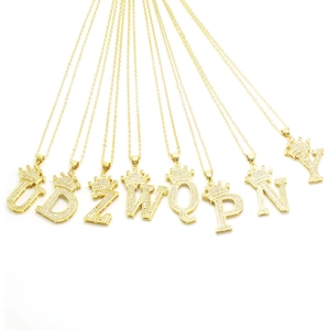 Golden crown alphabet necklaces with sparkling zircon pendants on sleek gold chains