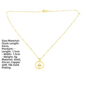 Detalle del colgante de cruz de nácar de 1,5cm, chapado en oro de 18k sobre cobre 42cm