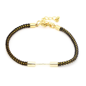 Detail of hand-woven black and gold spiral rope bracelet with adjustable metal lobster clasp
