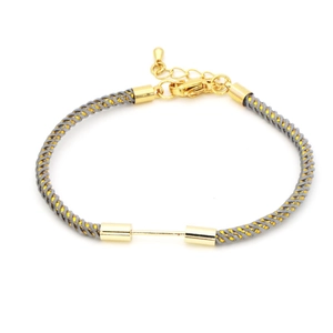 Detail of adjustable gray and gold braided nylon bracelet with a lobster clasp