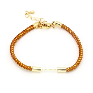 Detail of hand-woven brown nylon cord bracelet with adjustable lobster clasp and gold bars