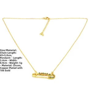 Detail view of paperclip pendant with colorful cubic zirconia in 18k gold plating