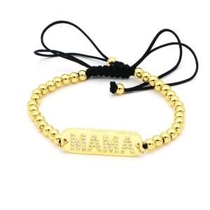 Bracciale con perline dorate con piastrina MAMA di diamanti e cordino nero regolabile