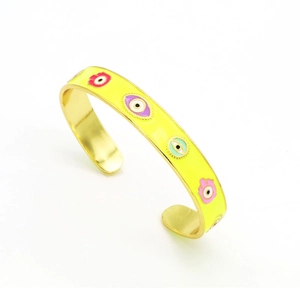 Golden Evil Eye cuff bracelet with yellow enamel finish and colorful Turkish eye charms