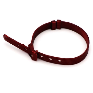 Macro shot of red Milanese mesh metal watch band with adjustable buckle on white background