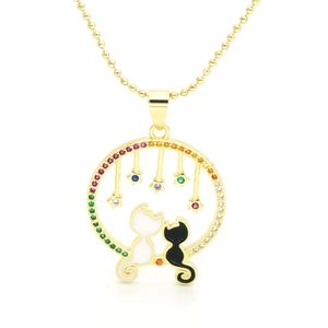 Detail of gold cat pendant with rainbow cubic zirconia frame and colorful star charms