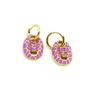 Macro detail of gold earrings with purple enamel pig nose charm and grid pattern