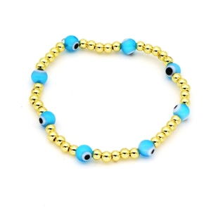 Bracciale bohémien con perline dorate e occhio turco azzurro per la fortuna e protezione