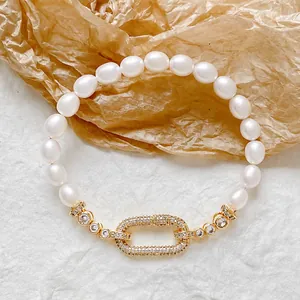 Bracciale di perle placcato oro con chiusura ovale in zircone dallo stile lussuoso