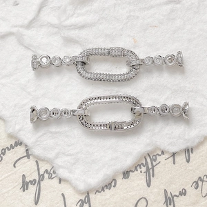 Macro shot of silver plated jewelry connectors with cubic zirconia for DIY bracelets