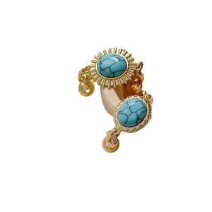 Orecchini placcati oro 18k con pietre blu e bordi metallici a raggiera testurizzati
