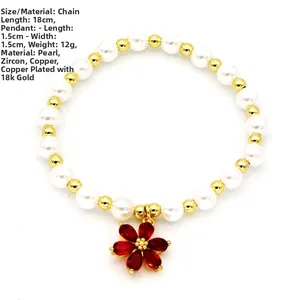 Detailed size view of pearl and gold bead bracelet with 1.5cm red flower zircon charm