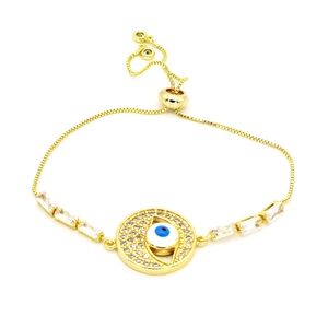 Bohemian gold evil eye bracelet with blue zircon accents and adjustable slider clasp
