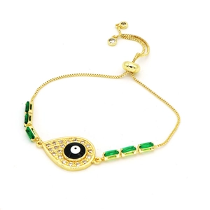 Bohemian evil eye bracelet in gold finish with green crystals and adjustable slider clasp