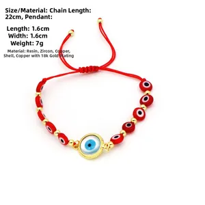 Detail showing 22cm red braided cord evil eye bracelet with 1.6cm 18k gold plated charm