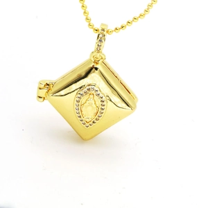 Gold vintage square locket necklace with religious relief and white crystal accents