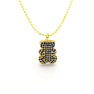 Goldene Kugelkette mit einem Bären-Anhänger, besetzt mit dunkelblauen Zirkonia