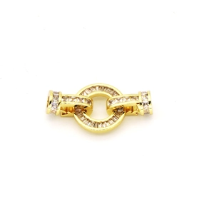 Detailed view of round gold-plated connector clasp set with sparkling cubic zirconia