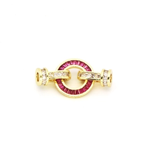 Detail of gold jewelry connector with red baguette zircon and pavé stones for DIY necklaces