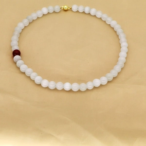Elegant natural agate beaded necklace with white translucent stones and a red accent bead