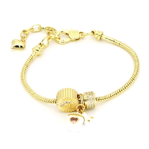 Gold plated snake chain bracelet with evil eye beads and white enamel heart charm