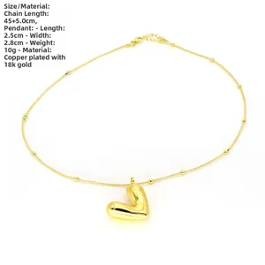 Detalle de longitud 45+5cm y especificaciones del colgante corazón oro 18k