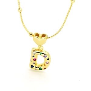 Detail of 18k gold heart necklace with letter D pendant and colorful zircon stones