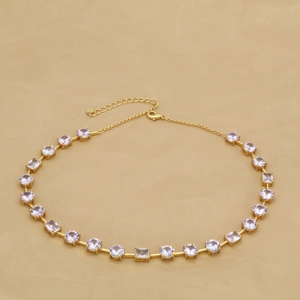 Elegant gold necklace with rectangular emerald green and round clear cubic zirconia stones