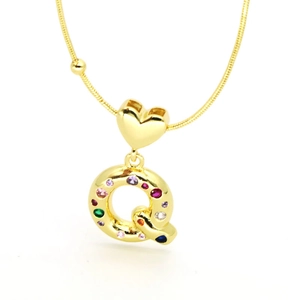 Detail of 18k gold plated heart pendant with colorful zircon letter Q on snake chain