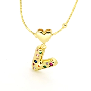 Detail of 18k gold plated heart clasp and letter L pendant with colorful zircon stones