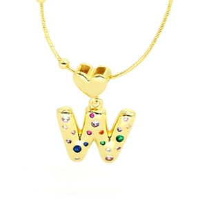 Macro shot of letter W pendant with colorful zircons and heart clasp on gold chain