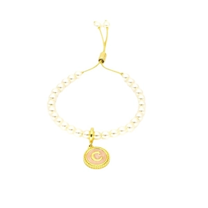 Adjustable pearl bracelet featuring a gold letter C pendant on a white background