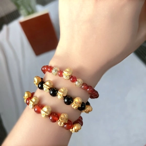 Chinese zodiac snake bracelet with agate beads and gold lucky charms for prosperity