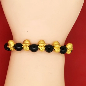 2025 Year of the Snake beaded bracelet with gold zodiac charms and black obsidian stones