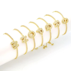 18k gold plated balloon initial tennis bracelet with full cubic zirconia paving