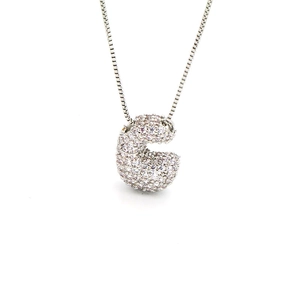 Macro shot of silver box chain and 3D puffy initial C pendant with zircon pave setting