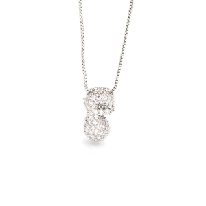 Macro view of silver peanut pendant necklace with pavé-set white cubic zirconia