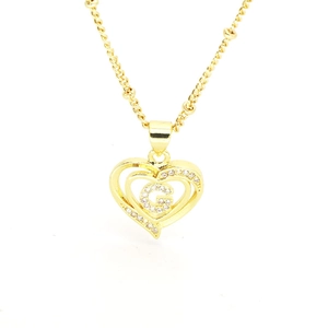 Close-up of heart-shaped 18k gold plated pendant necklace with zircon letter G detail
