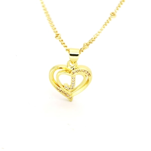 Detailed close-up of 18k gold plated heart pendant necklace with letter J and zircons